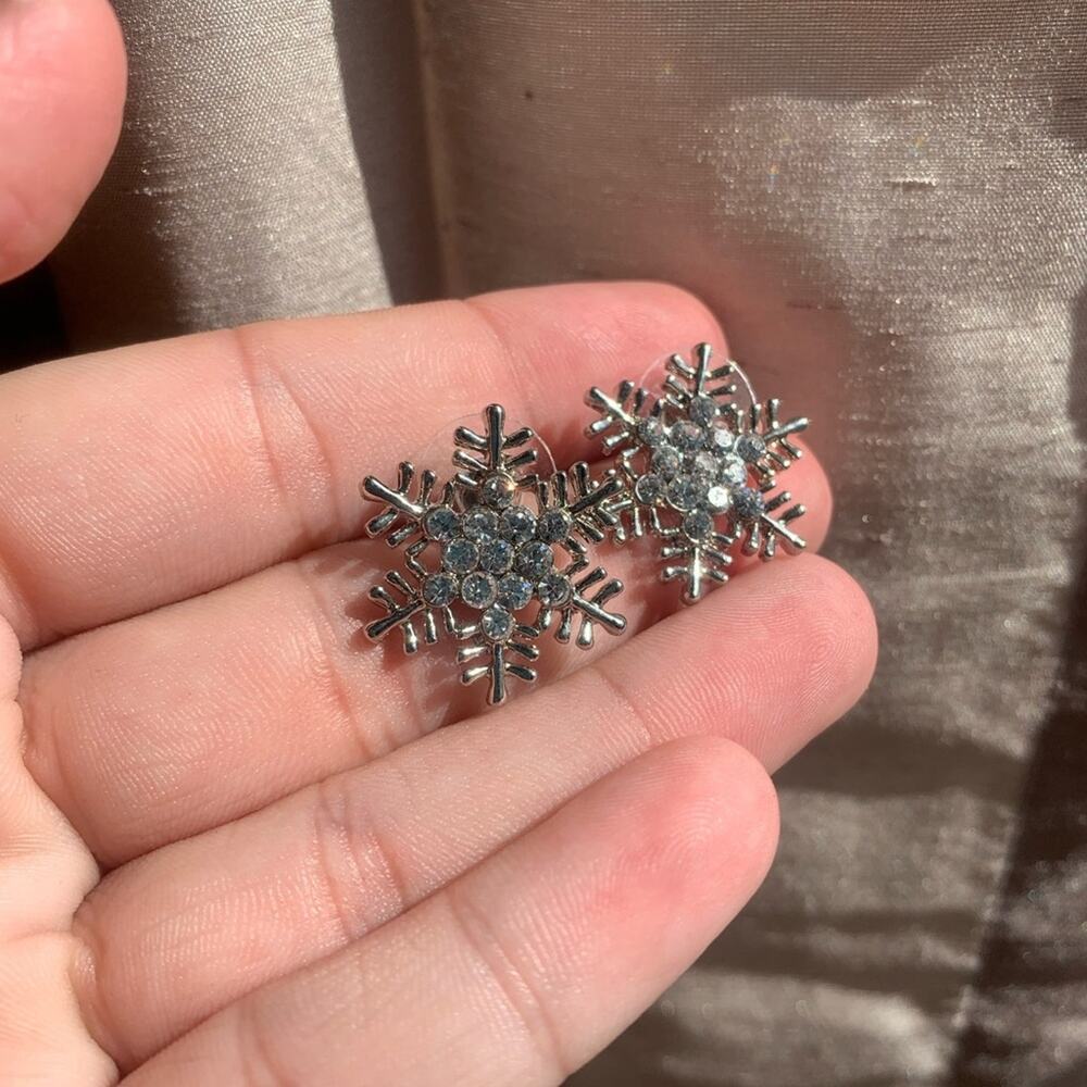 Big silver snowflake stud earrings